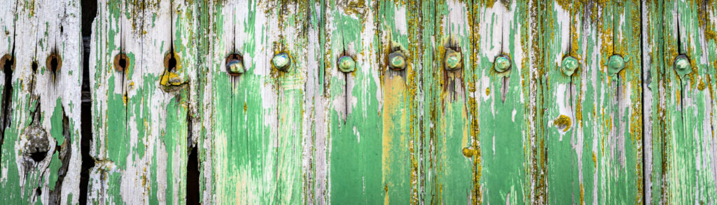wooden wall with some paint